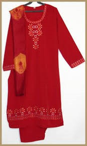 red and yellow embroidered kurta set featuring delicate golden floral embellishments on the front and sleeves