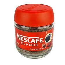 Nescafé Classic soluble coffee powder featuring a distinct bright red plastic lid and label.