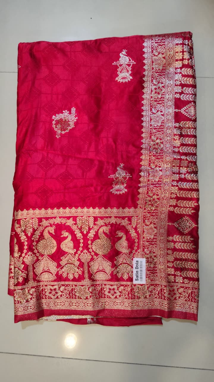 Banarasi Satin Dola Silk Saree (often featuring Zari Weaving and Peacock Motifs).