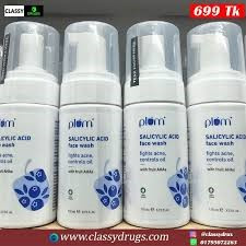 white and blue pump bottle of Plum 1% Encapsulated Salicylic Acid Foaming Face Wash (110 ml), which appears to be designed for oily and acne-proneNivea Fresh Powerfruit shower gel with a wild berry