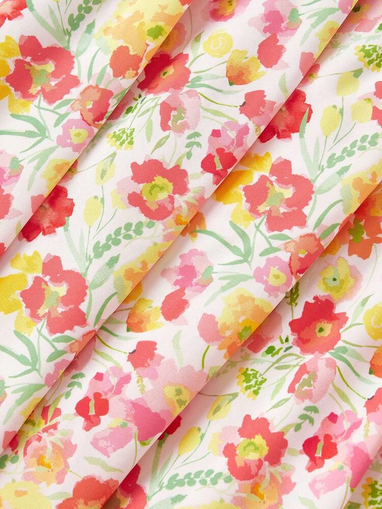 folded piece of printed dress fabric colourful with flowerful saree