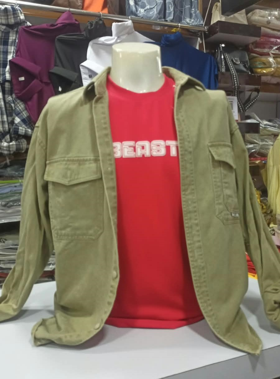 relaxed-fit brown jersey overshirt from Uniqlo featuring dual chest utility pockets and a soft brushed texture.