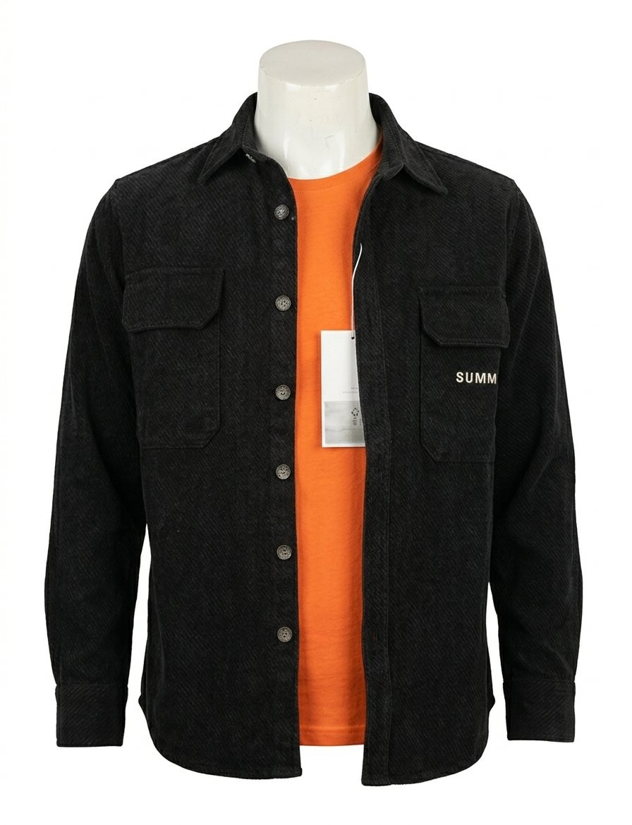 black corduroy button-down long-sleeve shirt layered over a vibrant orange t-shirt with dual chest pockets.